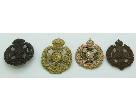 Four British Army Rifle Brigade metal hat badges including an enamelled pin back example