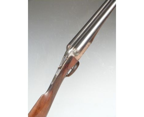 Holland and Holland 12 bore side by side shotgun with named and border engraved lock, thumb lever, underside and trigger guar