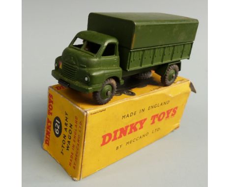 Dinky Toys diecast model 3-ton Army Wagon with green body, cover and hubs, 621, in original box.