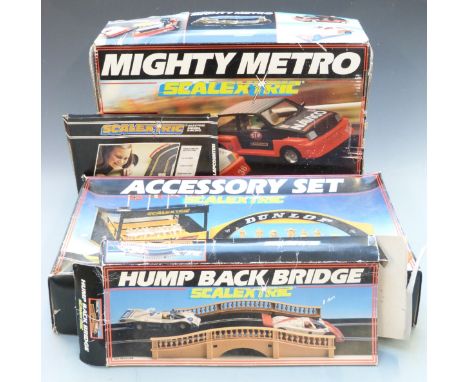 Four Hornby Scalextric model motor racing sets and accessories comprising Mighty Metro Racing Set C.580, Accessory Set C.221,