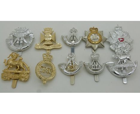 Ten British Army Infantry anodised cap badges including Durham Light Infantry, Wiltshire Regiment and Royal Bedfordshire Regi