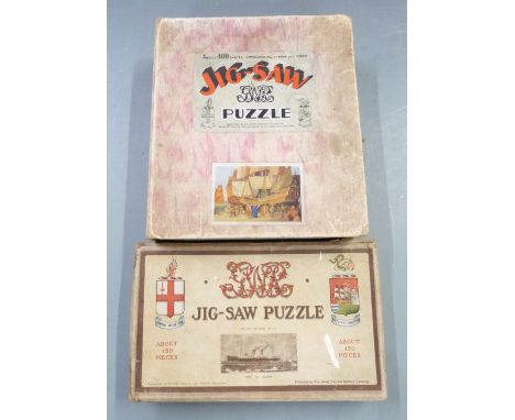 Two Chad Valley Great Western Railway GWR jig-saw puzzles Drake Goes West and The St Julien, both in original boxes.&nbsp;