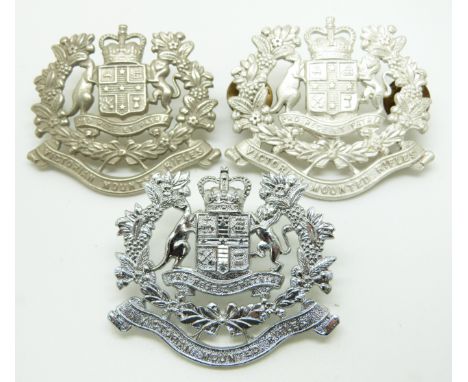 Three Australian Army Victorian Mounted Rifles metal hat badges