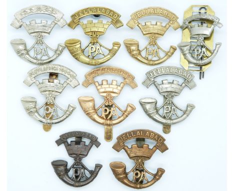 Nine British Regiment Somerset Light Infantry metal badges including four Somerset Battalion examples
