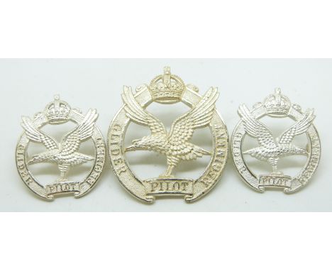 British Army Pilot Regiment officer's cap badge together with a pair of collar badges, all by Firmin London&nbsp;