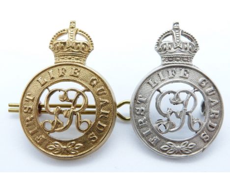 Two British Army First Life Guards metal cap badges, one marked silver to reverse