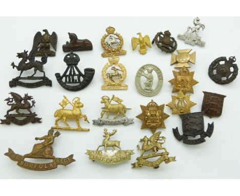 Small collection of British Army&nbsp;metal badges including Essex Regiment, Norfolk Regiment, Buffs, Brecknockshire Regiment