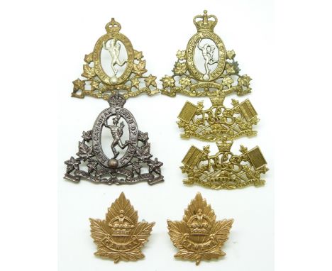 Seven Canadian Army Royal Canadian Corps of Signals metal badges including a pair of collar badges