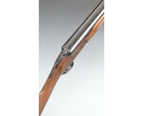 Browning 20 bore side by side ejector shotgun with engraved lock, thumb lever, underside and trigger guard, chequered grip an