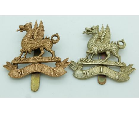Two British Army Montgomeryshire Imperial Yeomanry other ranks white metal cap badges plus one other