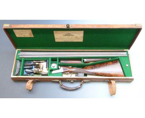 William Powell & Son 12 bore side by side ejector shotgun with named and engraved locks, fine scrolling engraving to the trig