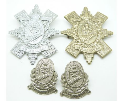 Four New Zealand Army Scottish Regiment metal badges including one chromed example