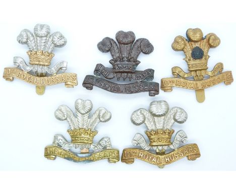 Five British Army 10th Royal Hussars metal cap badges including officer's service dress and an all brass example