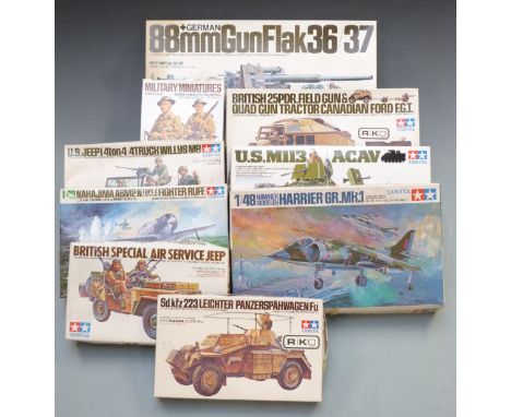 Nine Tamiya 1:35&nbsp;scale plastic model kits including Flak 36/37, M113 ACAV, and Willys MB, all in original boxes.