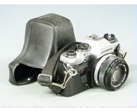 Olympus OM-10 SLR camera with 50mm 1:1.8 lens