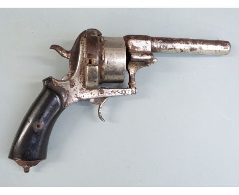 A 12mm pinfire 8-shot double action percussion hammer action revolver with engraved frame, shaped wooden grips, belt loop and