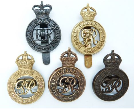 Five British Army Royal Horse Guards metal cap badges including and Officer's Service Dress example