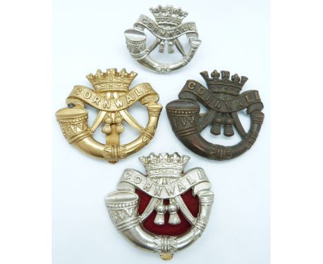 Four British Army Cornwall Light Infantry metal badges