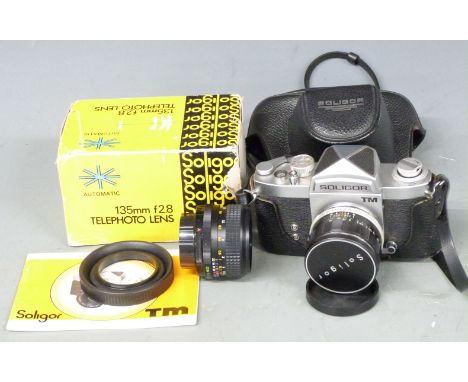 Soligor TM SLR camera, with Soligor 50mm and 135mm telephoto lenses and Helios wide angle f=28mm lens