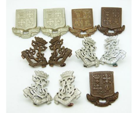Eleven British Army Kensington Regiment (Princess Louise's) metal collar badges in five pairs plus one