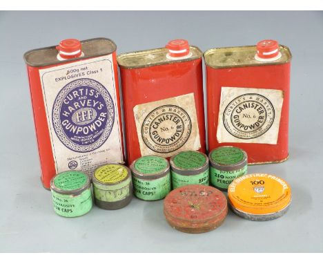 Ten vintage gun and ammunition related tins including three Curtis And Harvey's gunpowder canisters, F Joyce &amp; Co percuss
