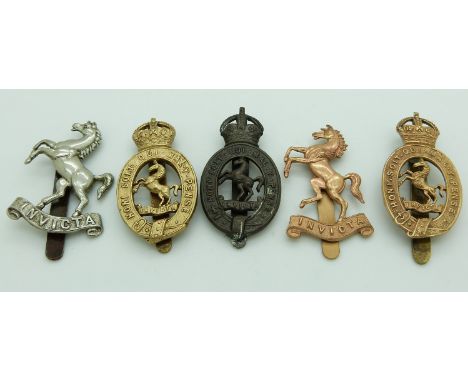 Five British Army West / East Kent Yeomanry metal cap badges