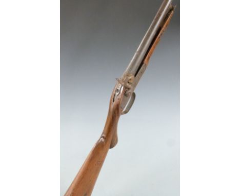 Percussion hammer action gun with engraved lock, trigger guard and storage compartment to the stock, chequered semi-pistol gr