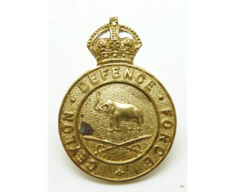 British Army Ceylon Defence Force officer's gilt cap badge, J.R Gaunt maker's name to reverse