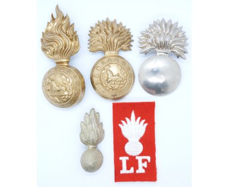 Four British Army Lancashire Fusiliers&nbsp;/ Fusiliers metal badges and a cloth patch example