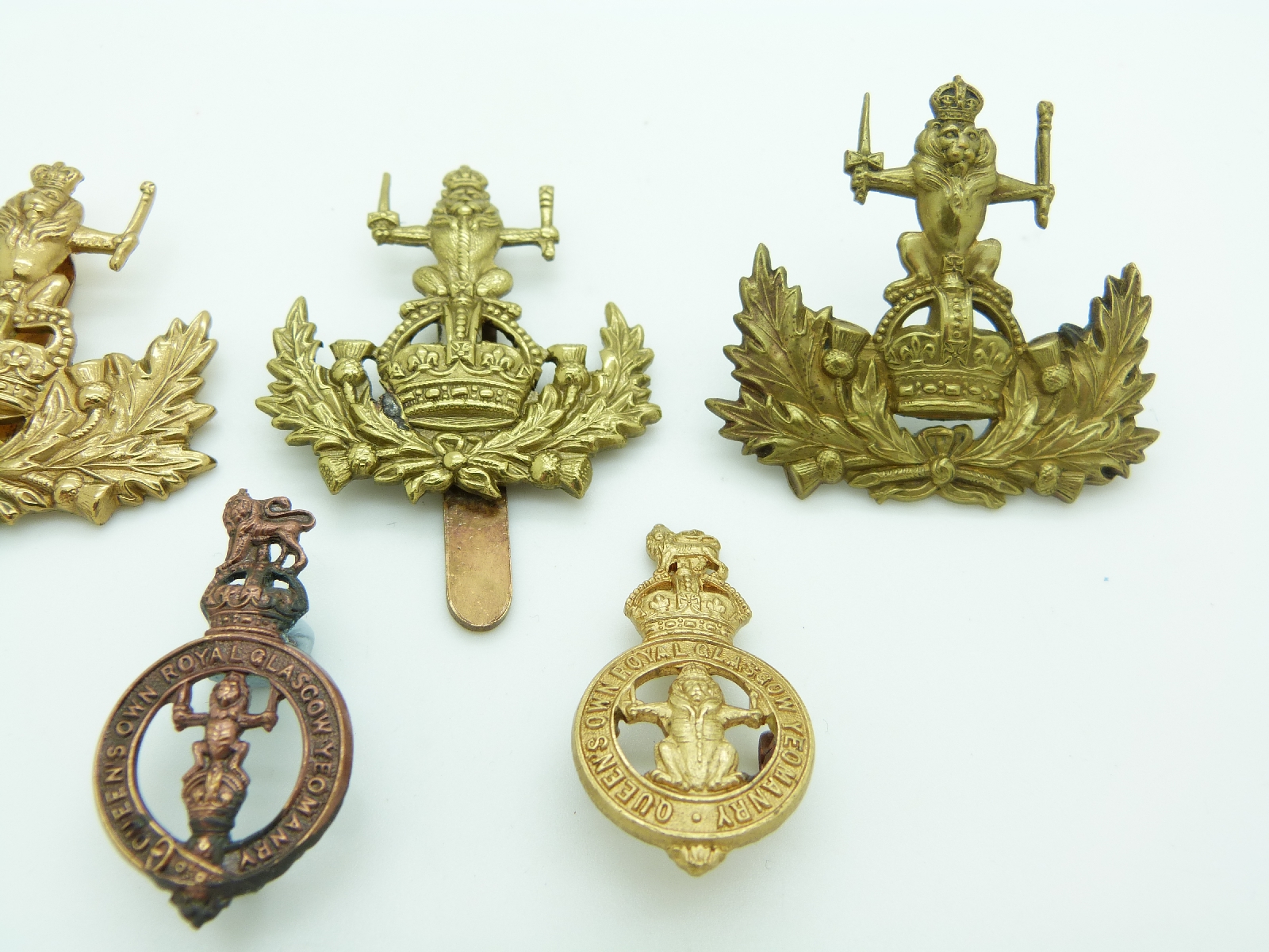 Seven British Army Queen's Own Glasgow Yeomanry metal badges