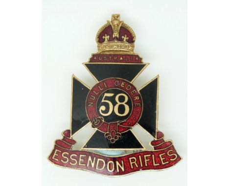 Australian Army 58th Essendon Rifles Regiment enamelled hat badge, maker's mark Angus and Coote, Sydney to reverse