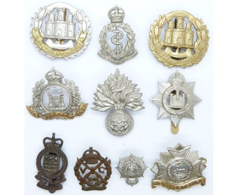 Ten British Army metal cap badges including Suffolk Volunteer Corps, Suffolk Regiment, Northamptonshire Regiment, Devonshire 