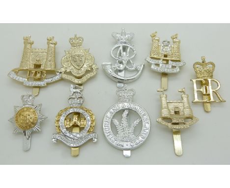 Nine British Army Yeomanry anodised badges including the Loyal Suffolk Hussars, Sussex Yeomanry, and Devonshire Territorials 