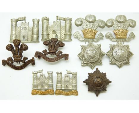 Eleven British Army metal collar badges for the 3rd Dragoon Guards, 5th Inniskilling Dragoon Guards, 4th Royal Irish Dragoons