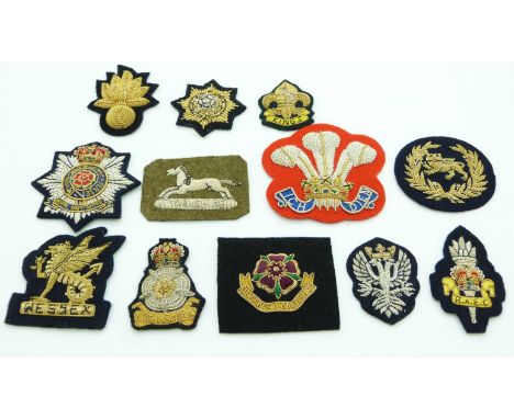 Twelve British Army King's Own Border Regiment, Queens Lancashire Regiment, Royal Hampshire Regiment etc bullion badges