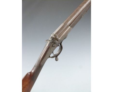 John Hanson of Lincoln 14 bore hammer action shotgun with scrolling engraving and J Hanson to the lock, engraved hammer, top 