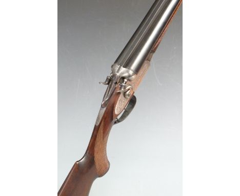 AYA 12 bore side by side hammer action shotgun with engraved locks, underside and top plate, chequered semi-pistol grip and f