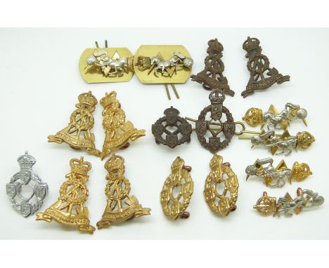 Seventeen British Army Labour Corps and R.E.M.E pre and post 1947 metal collar badges in eight pairs plus one.