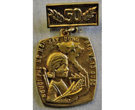 Vietnam 50th Anniversary of the New Woman Badge It celebrates the 50th Anniversary of the women's association who work for an