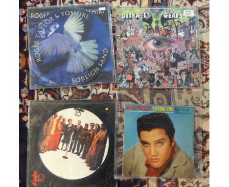 Collection of vinyl records (albums).Collection includes Status Quo' From the makers of this item is in a blue tin container.