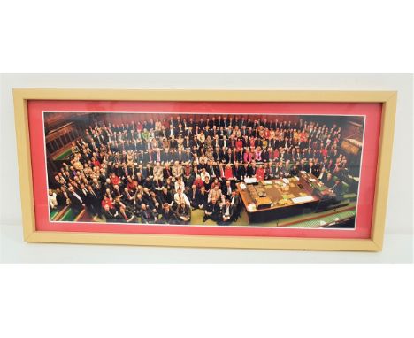 THE LABOUR PARTYphotographic print of the 1997 Labour party in the House of Commons, signed by many to verso, 16cm x 44.5cm 