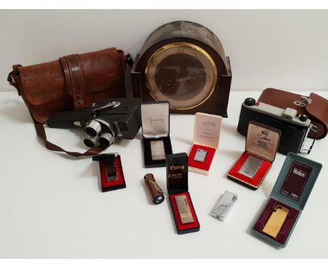 MIXED LOT OF COLLECTABLESincluding an eight day mantle clock, Kodak Junior II camera and case, Mansfield Holiday Meter Matic 