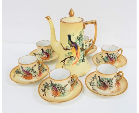 CONTINENTAL PORCELAIN COFFEE SERVICEdecorated with a yellow ground and birds of paradise with gilt highlights, comprising a c