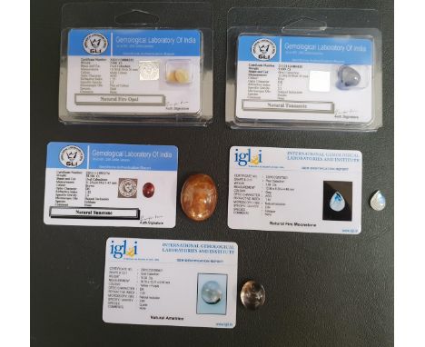 FIVE CERTIFIED LOOSE CABOCHON GEMSTONEScomprising an oval cabochon natural tanzanite weighting 9.65cts, an oval Cabochon natu