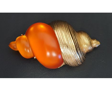 1980s CHRISTIAN DIOR SHELL SHAPED BROOCHin gold tone with orange resin detail, designed by Robert Goosens in 1987 for the lau