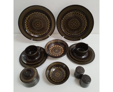 MIKASA POTTERY DINNER SERVICEwith a green and brown decorative ground, comprising six dinner plates, six soup bowls, six side