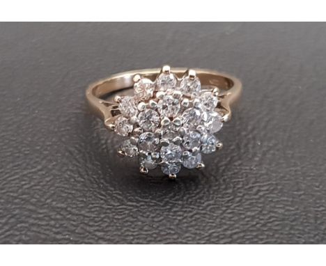 DIAMOND CLUSTER RINGthe nineteen diamonds totalling approximately 0.85cts, on nine carat gold shank, ring size N-O 