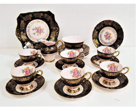 PINK VOGUE FINE BONE CHINA TEA SETwith floral decoration and 22 carat gold detail, comprising six cups, saucers and side plat