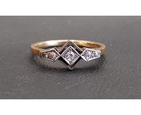 ART DECO DIAMOND RINGthe central diamond in angular pierced setting flanked by further diamonds to each side, in all approxim