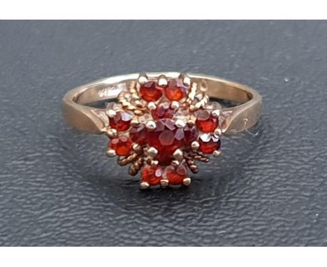 GARNET CLUSTER RINGon nine carat gold shank, ring size L and approximately 1.9 grams 